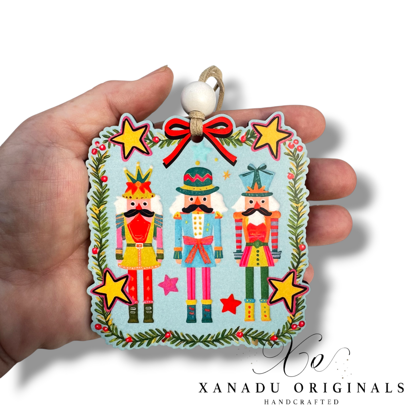 Nutcracker Trio Christmas Ornament with Colorful Holiday Border and Stars