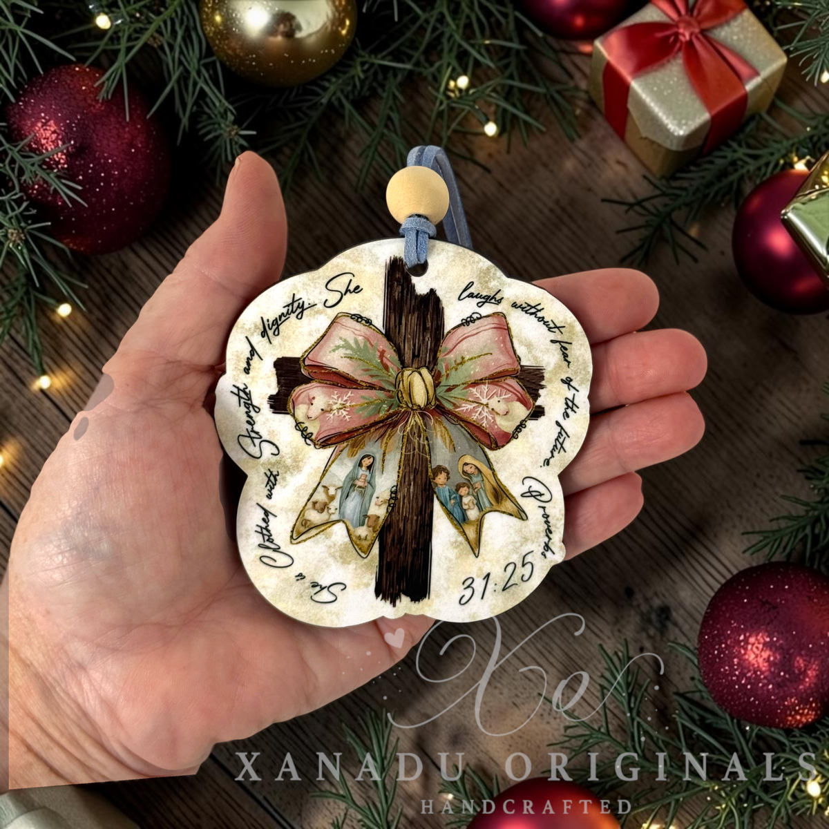⢠Retro religious Christian woman gift ornament measuring 3.32 by 3.5 inches held in a hand next to holiday tree decorations.
