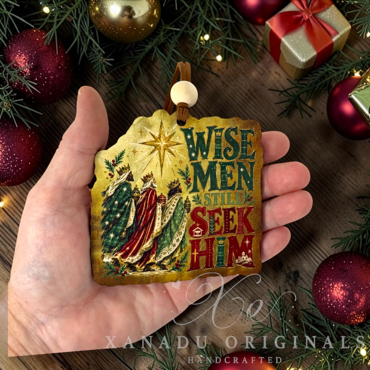 Retro religious Christmas nativity ornament measuring 3.45 by 3.45 inches held in a hand next to festive holiday decorations.