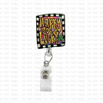 Happy Go Lucky Interchangeable Badge Button with Reel Option