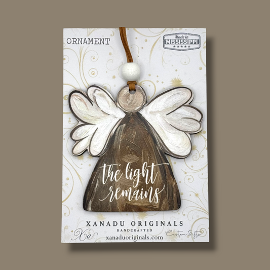 The Light Remains Brown Angel Christmas Ornament
