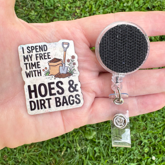 Dirt Bag and Hoes Interchangeable Badge Button with Reel Option