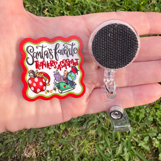 Santa's Favorite Teacher's Assistant Interchangeable Badge Button with Reel Option