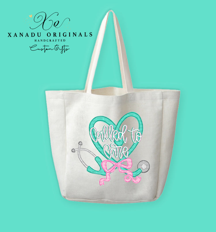 A cream-colored polyester linen tote bag featuring a graphic illustration of a teal stethoscope shaped like a heart with a pink ribbon bow. Inside the heart, stylized cursive text reads "Called to Care" with dark teal outlines.