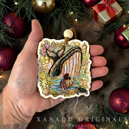 • Retro religious Bible story Christmas ornament measuring 3.24 by 3.55 inches held in a hand next to festive holiday decorations.
