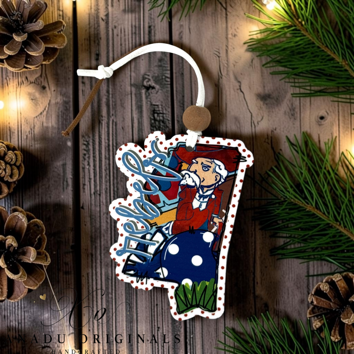 Ole Miss Rebels wood ornament cut into a Mississippi state silhouette featuring vintage Colonel Reb and blue cursive script on a navy polka dot backdrop.