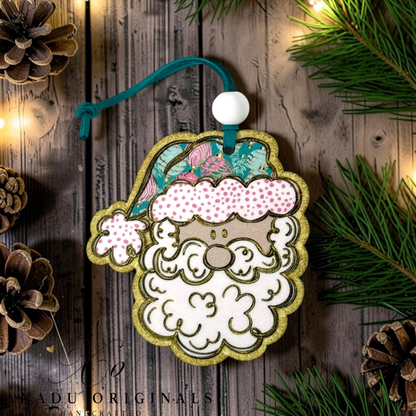 Retro chinoiserie Santa Claus wood ornament featuring a scroll outline curly beard, a pink polka dot hat brim, and a teal cap with pink botanical ornaments.