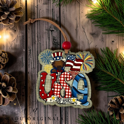 America 250 Years wood ornament featuring Uncle Sam behind patterned USA letters with exploding festive fireworks and a 250 Years scroll banner.