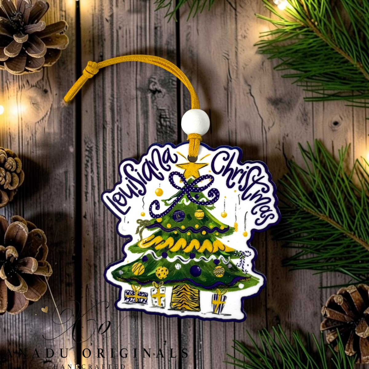 Louisiana Christmas wood ornament featuring a retro decorated evergreen tree with a purple polka dot bow and tiger striped holiday presents beneath it.
