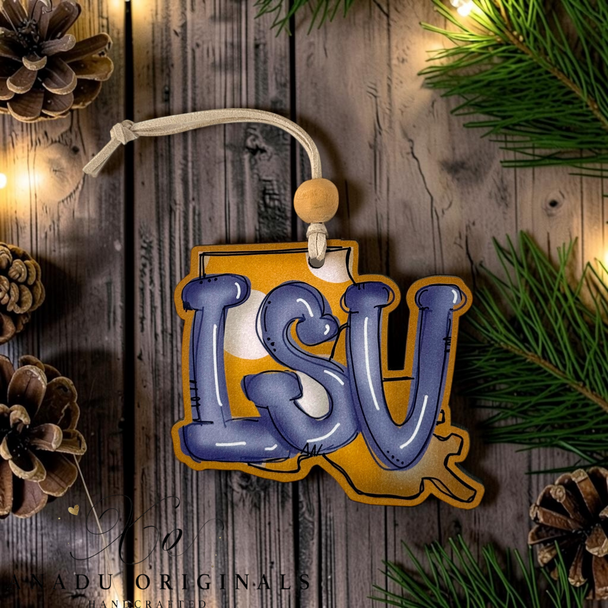 LSU Tigers wood ornament cut into a Louisiana state silhouette featuring large purple bubble letters on a vibrant golden yellow backdrop.