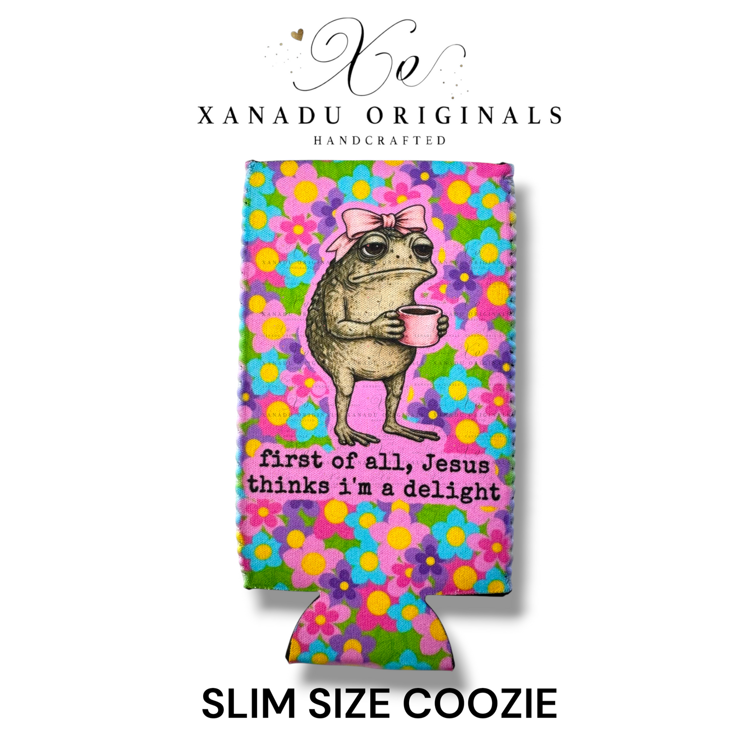 Xanadu Originals handcrafted retro floral neoprene slim can coozie featuring a funny grumpy toad with a pink bow holding a coffee mug and text reading first of all, Jesus thinks i'm a delight.