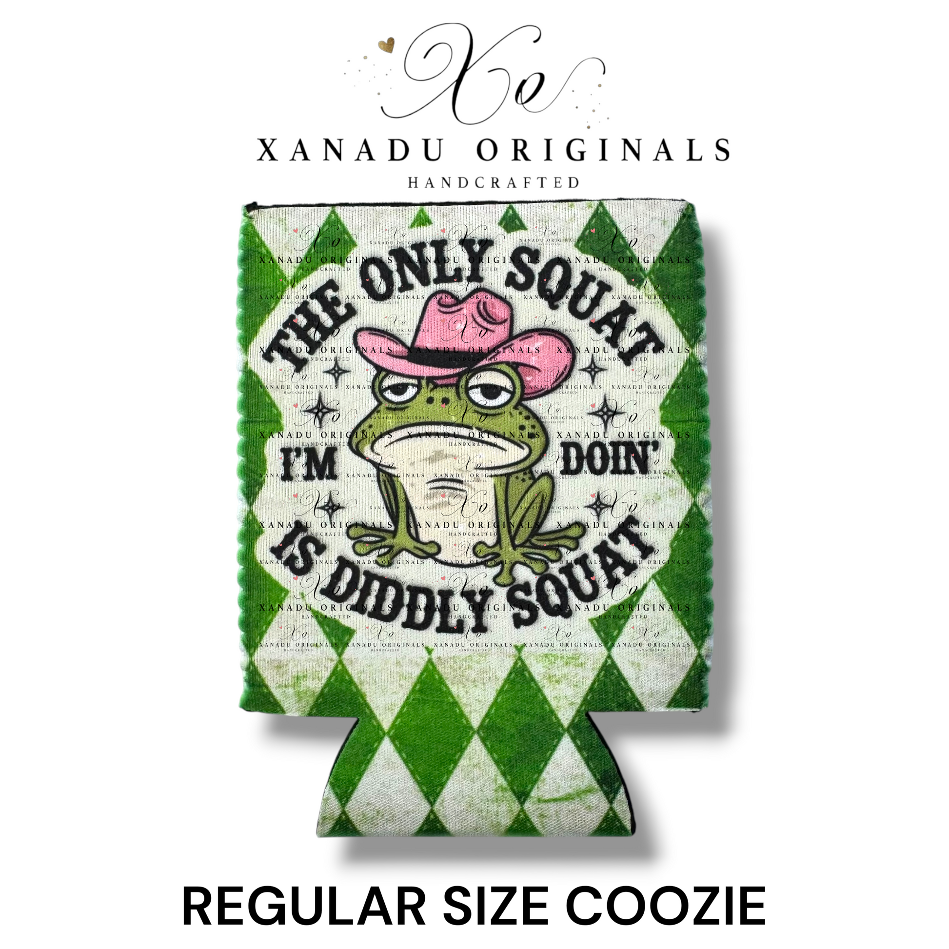 "Xanadu Originals handcrafted regular size neoprene can coozie featuring an illustrated grumpy green frog wearing a pink cowboy hat with the funny bold text 'THE ONLY SQUAT I'M DOIN' IS DIDDLY SQUAT' on a green and white diamond argyle background."
