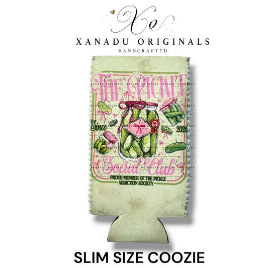 "Xanadu Originals handcrafted slim size neoprene can coozie featuring a vintage arrangement of glass pickle jars tied with pink bows, overlayed with the cursive text 'The Pickle Social Club' and a 'Proud Member of the Pickle Addiction Society' badge over a soft green grid background."
