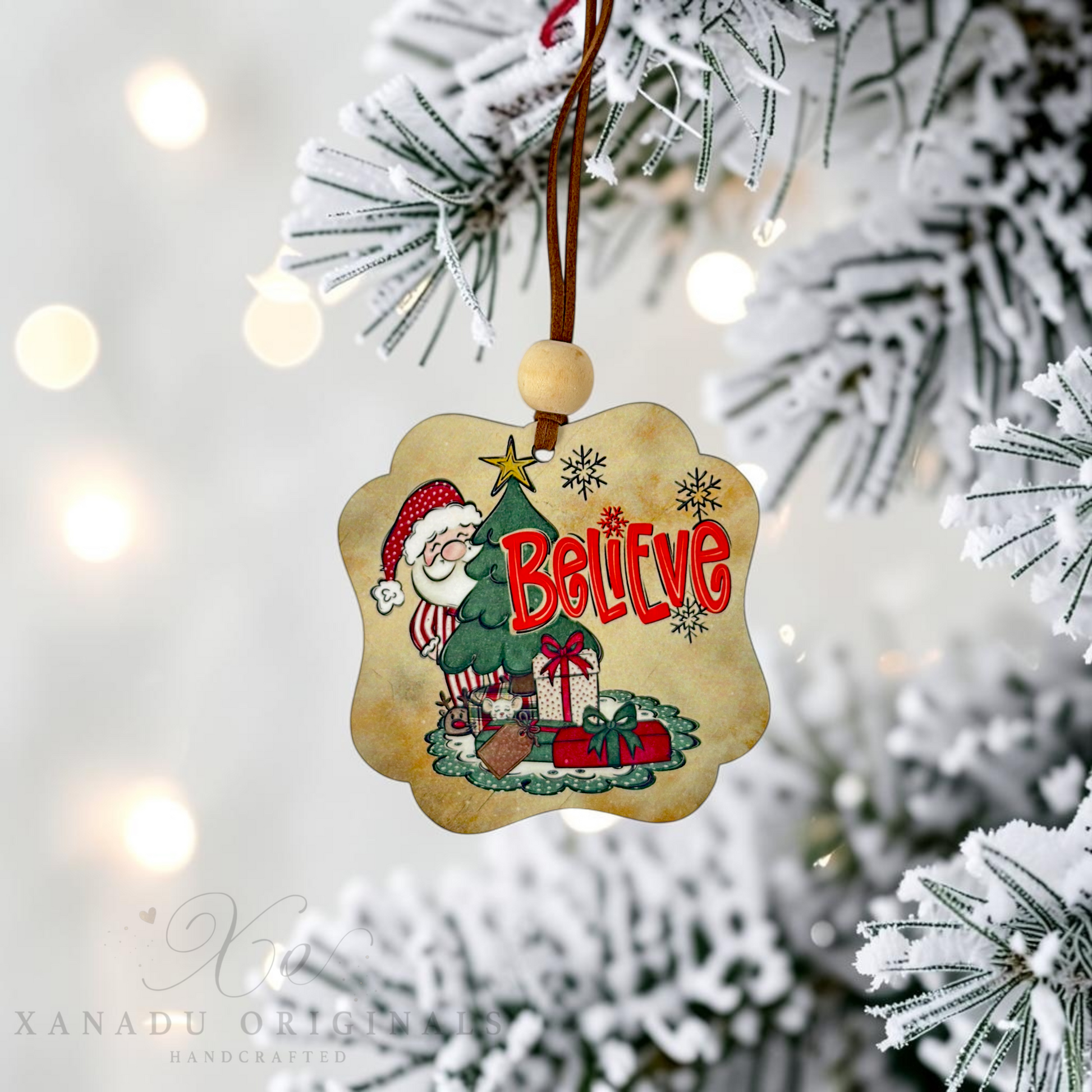 Scalloped wood vintage Santa ornament hanging gracefully from a branch of a white flocked Christmas tree with soft out-of-focus background holiday lights.